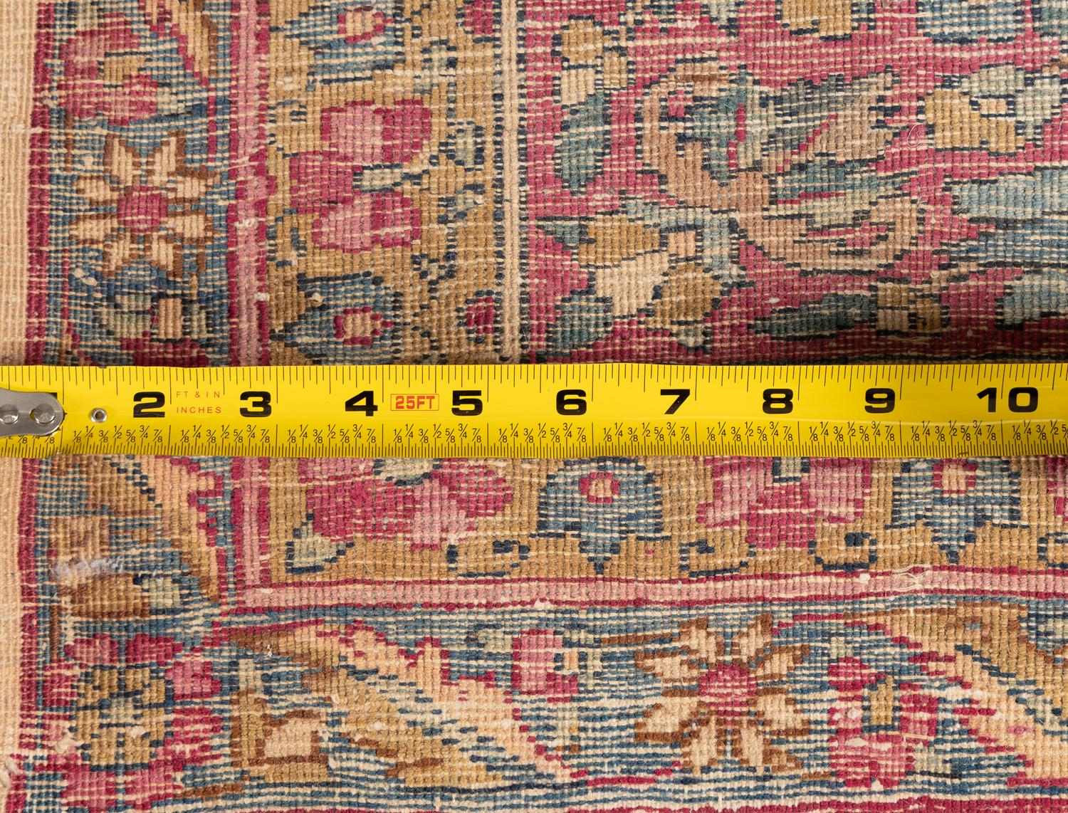 A Kirman Wool Rug