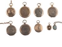 [EARLY PHOTOGRAPHY]. 18 daguerreotypes housed in 9 lockets.