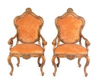 A Pair of Italian Rococo Style Carved and Painted Armchairs