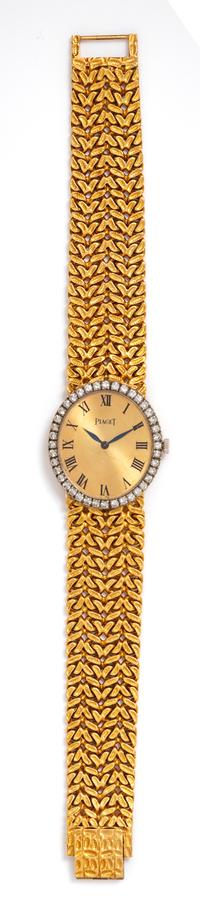 An 18 Karat Bicolor Gold and Diamond Ref. 9826 N 21 Wristwatch, Piaget, 35.60 dwts.