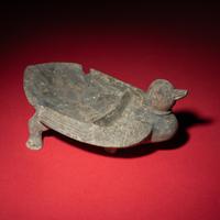 A Chinese Grey Pottery Mandarin Duck-Form Inkstone, Six Dynasties — 六朝 灰陶鴛鴦硯