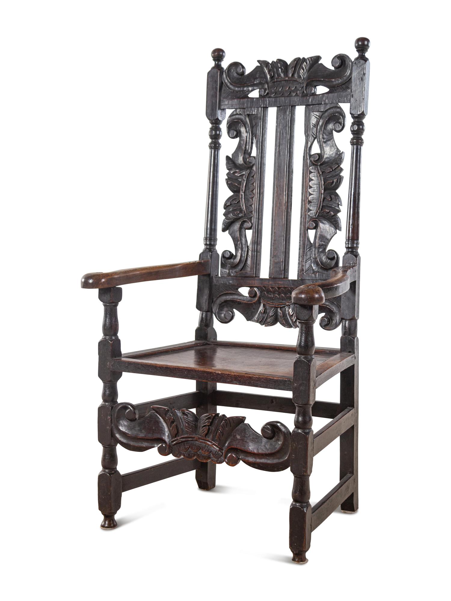 A William and Mary Carved Oak Armchair