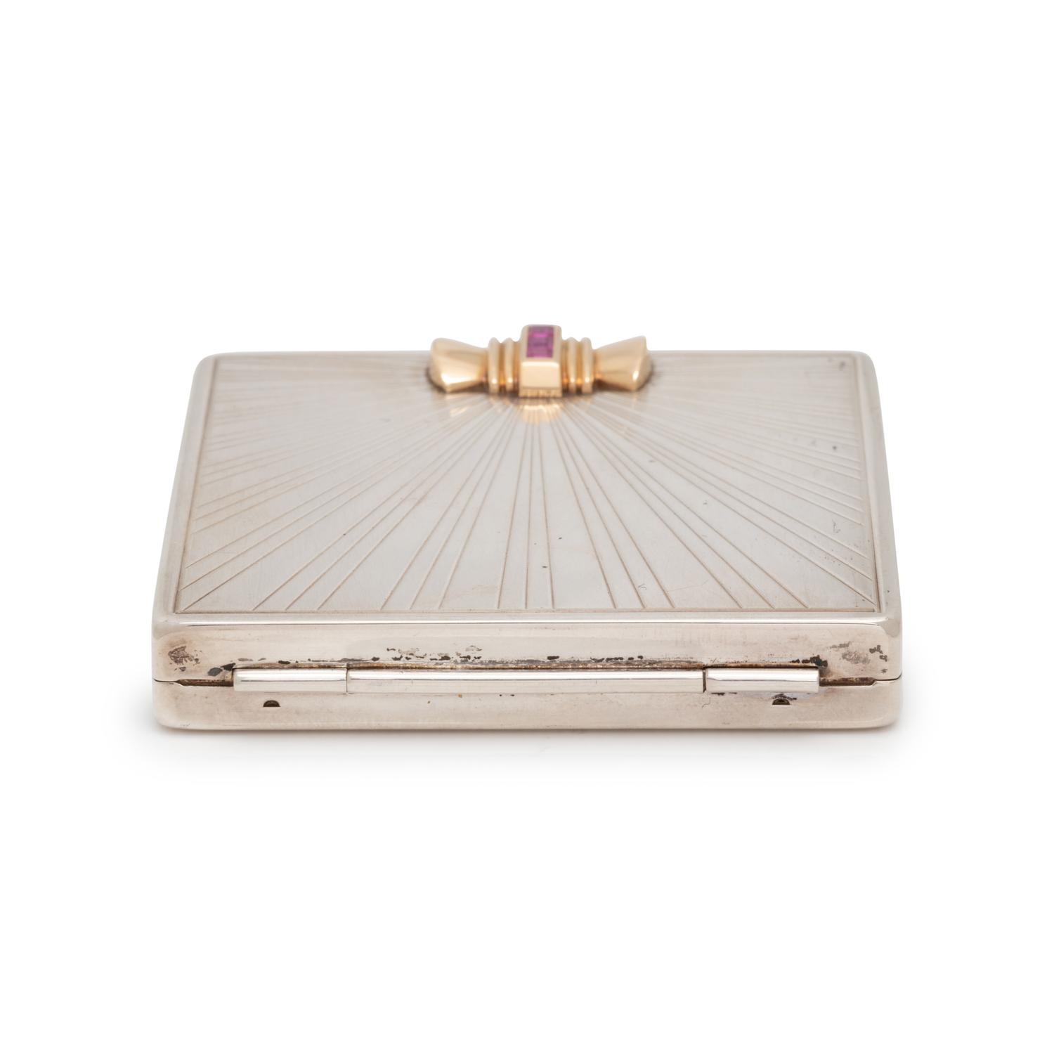TIFFANY & CO., RETRO, STERLING SILVER, YELLOW GOLD AND RUBY COMPACT