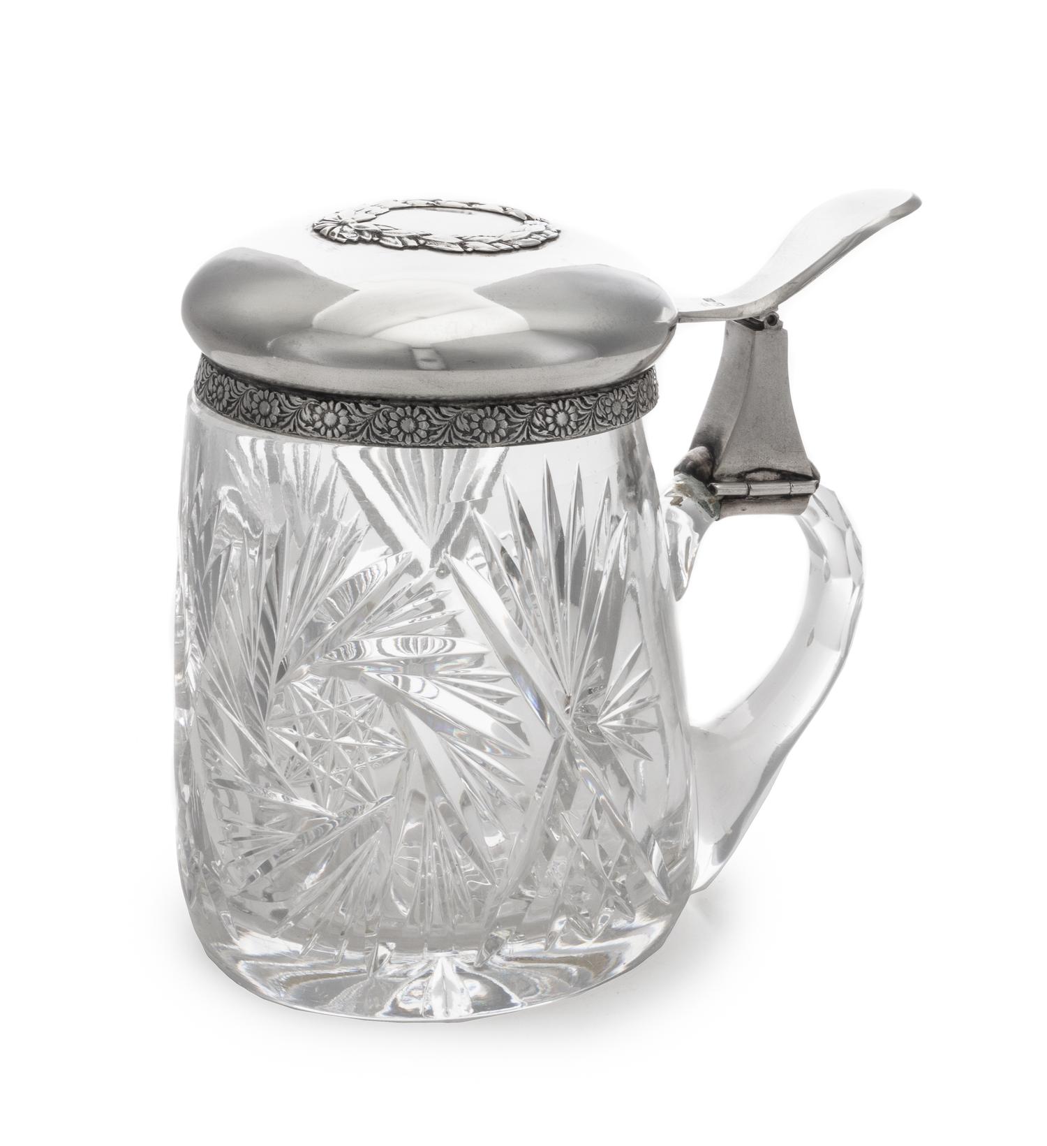 A Latvian Silver-Mounted Cut Glass Tankard, Likely Mark of L. Rosental, Riga, 20th Century, the lid with a foliate cartouche and rim ab