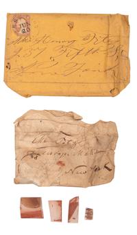 A collection of lenses and glass samples with manuscript notes addressed to Henry Fitz, New York, found in the workshop of George W. Fitz, Peconic, New York.