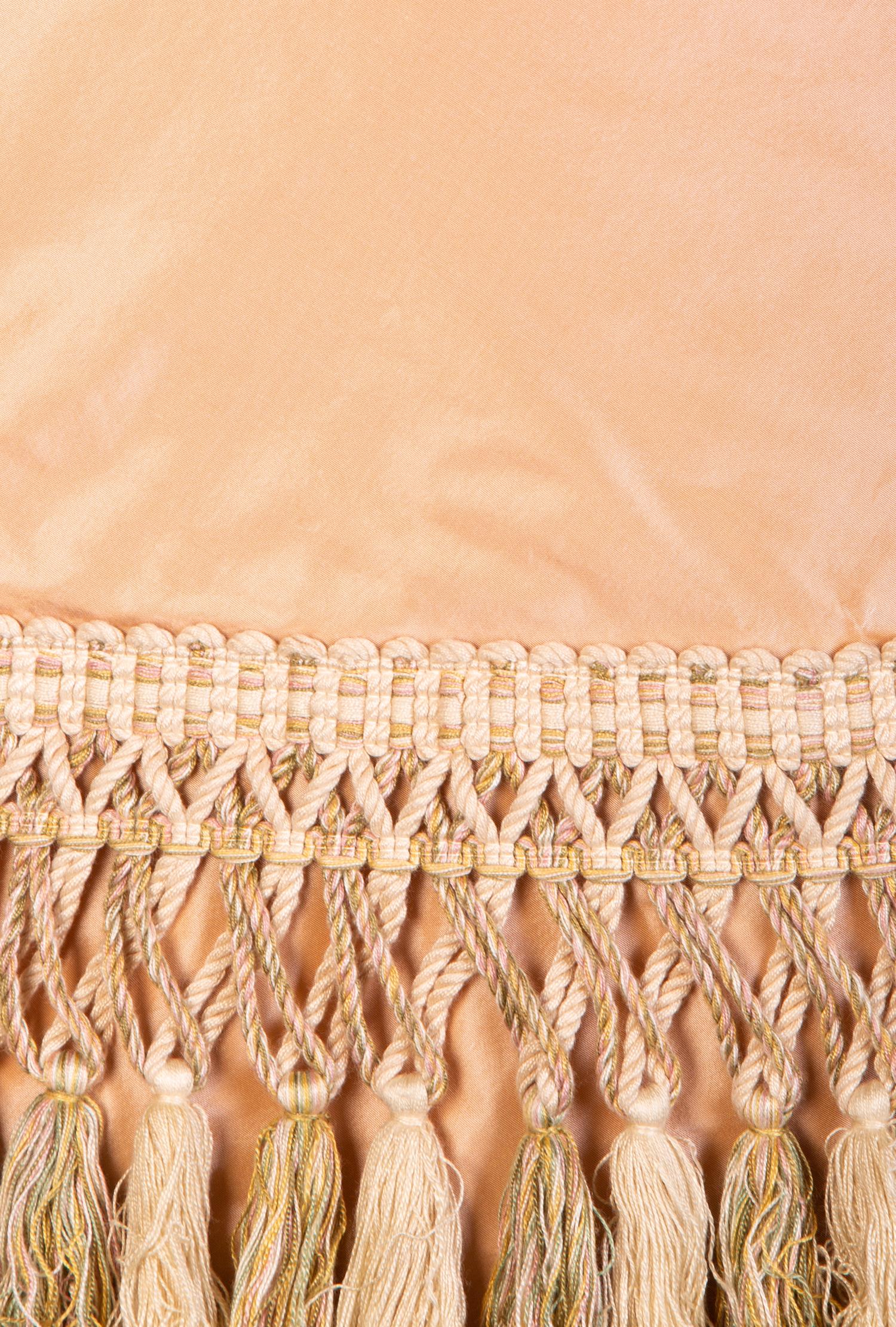A Pale Pink Silk Table Skirt with Tasseled Trim