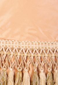 A Pale Pink Silk Table Skirt with Tasseled Trim