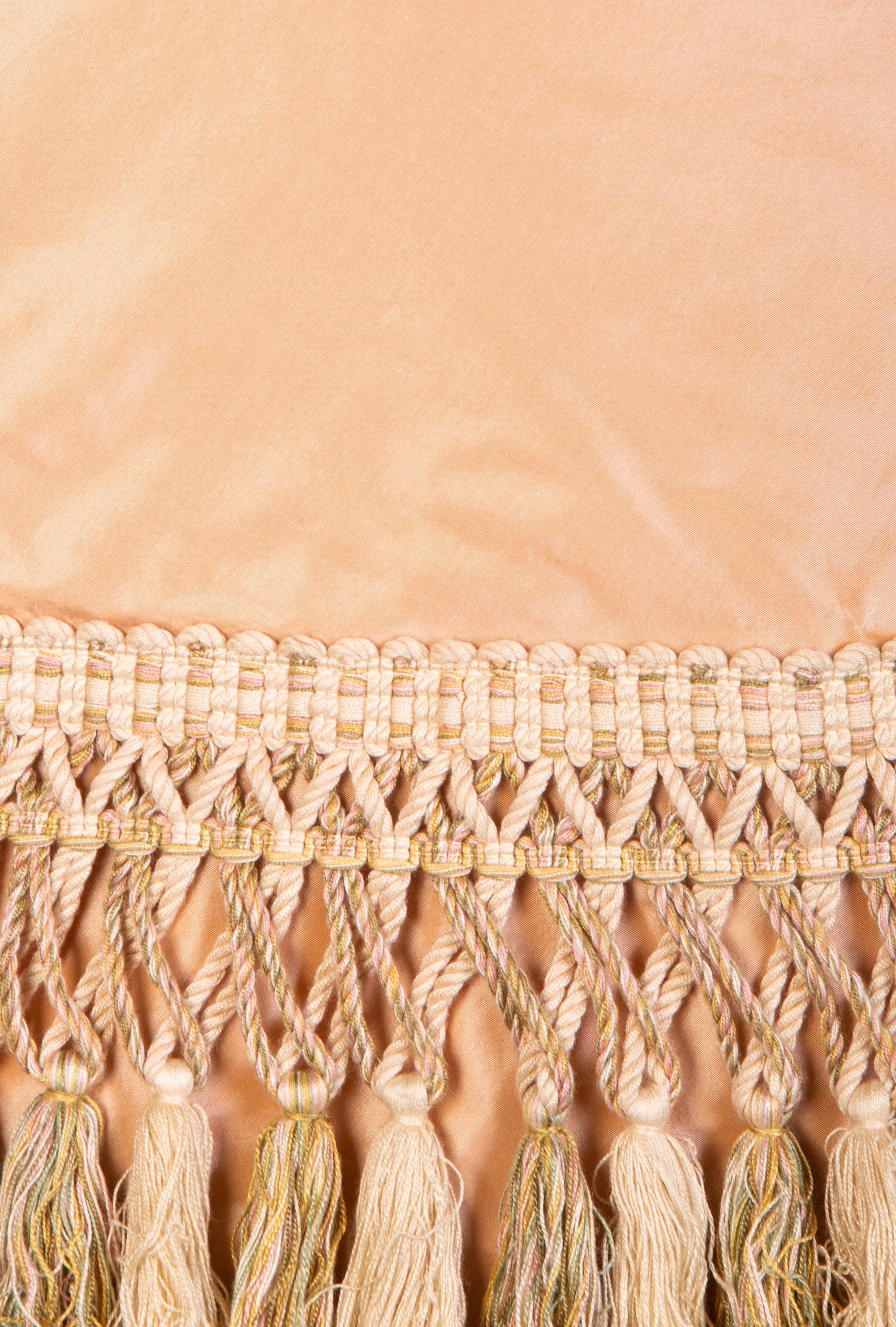 A Pale Pink Silk Table Skirt with Tasseled Trim