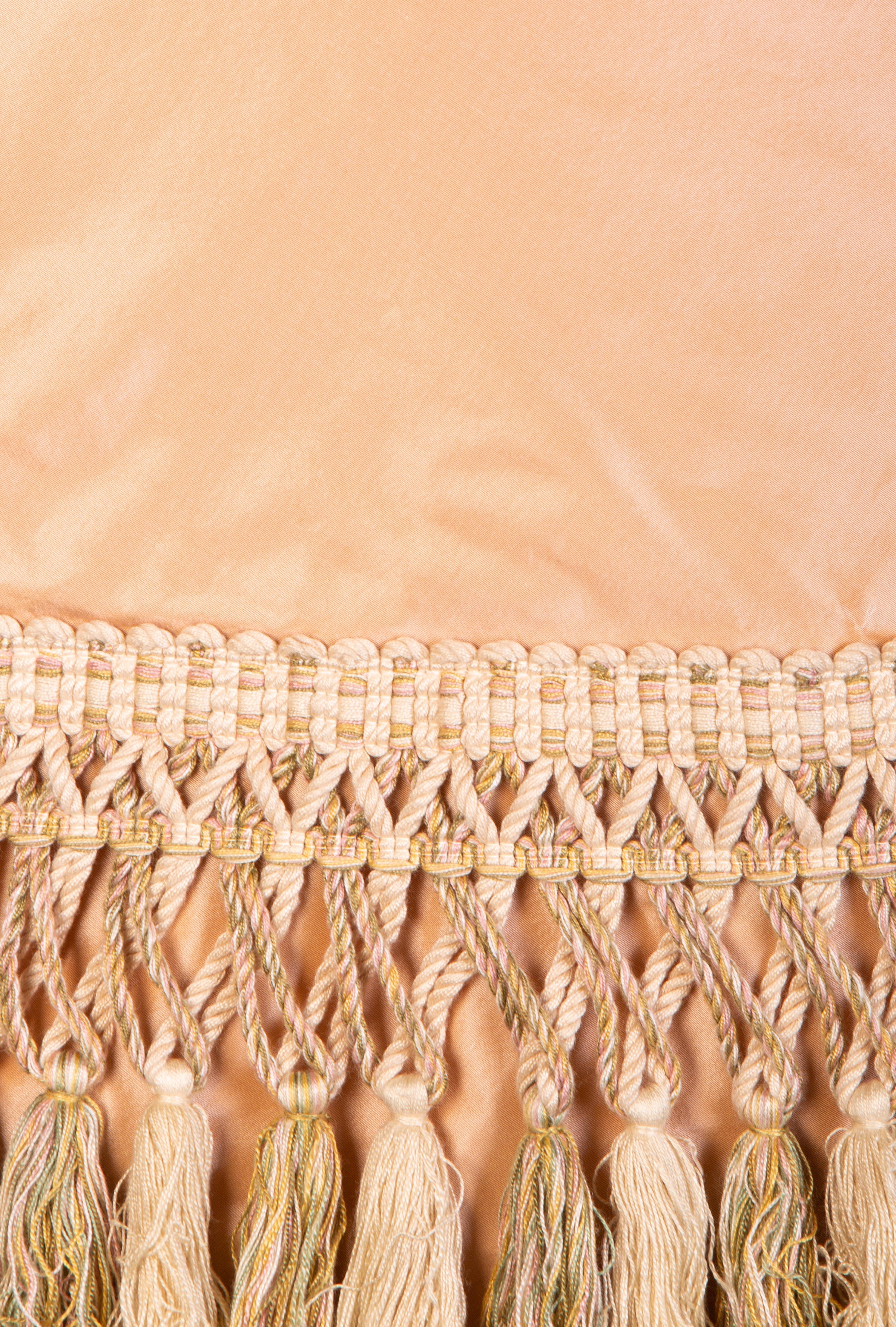 A Pale Pink Silk Table Skirt with Tasseled Trim
