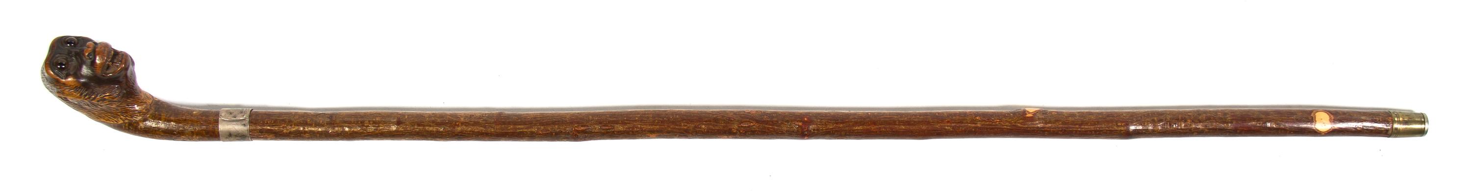 An English Silver Mounted Animalier Cane, Charles Cooke, Height overall 35 1/2 x height of head 2 1/4 inches.