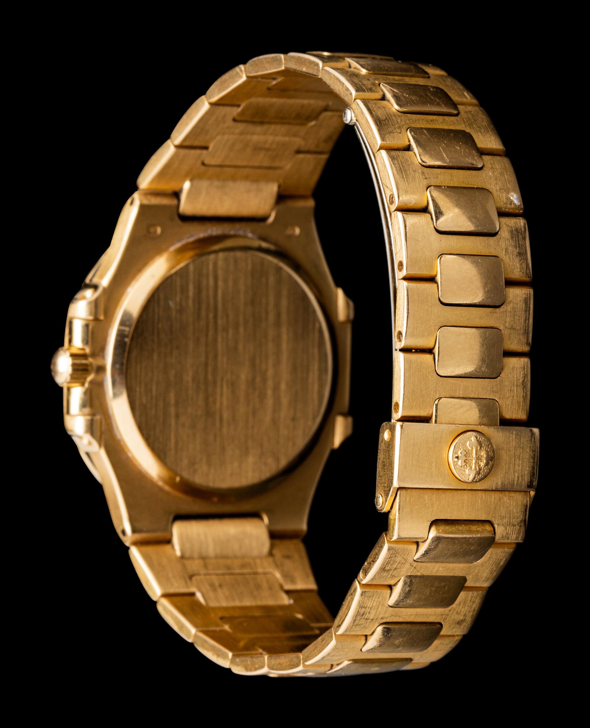 PATEK PHILIPPE, REF. 3900/1 18K YELLOW GOLD 'NAUTILUS' WATCH