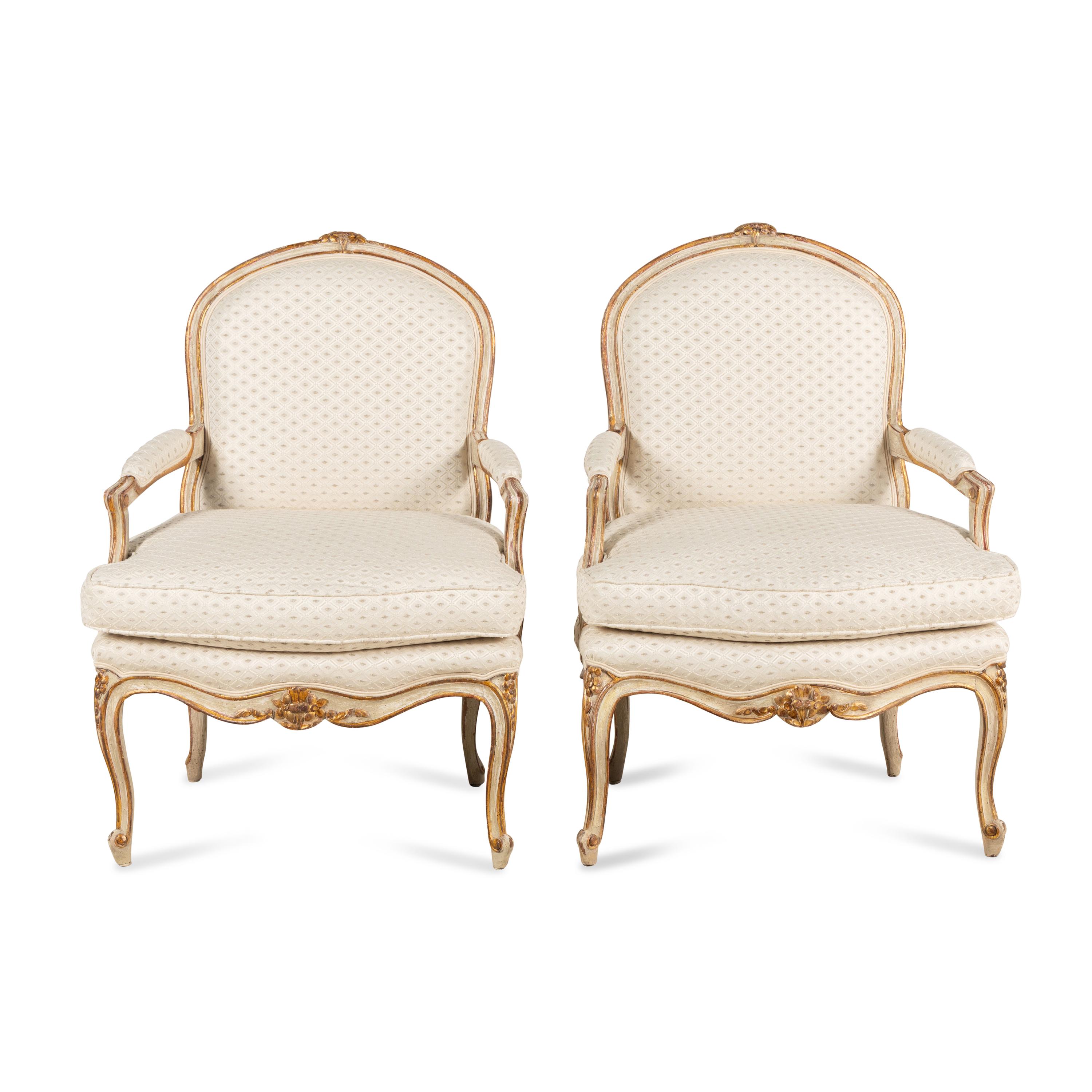 A Pair of Louis XV Style Painted and Parcel Gilt Fauteuils