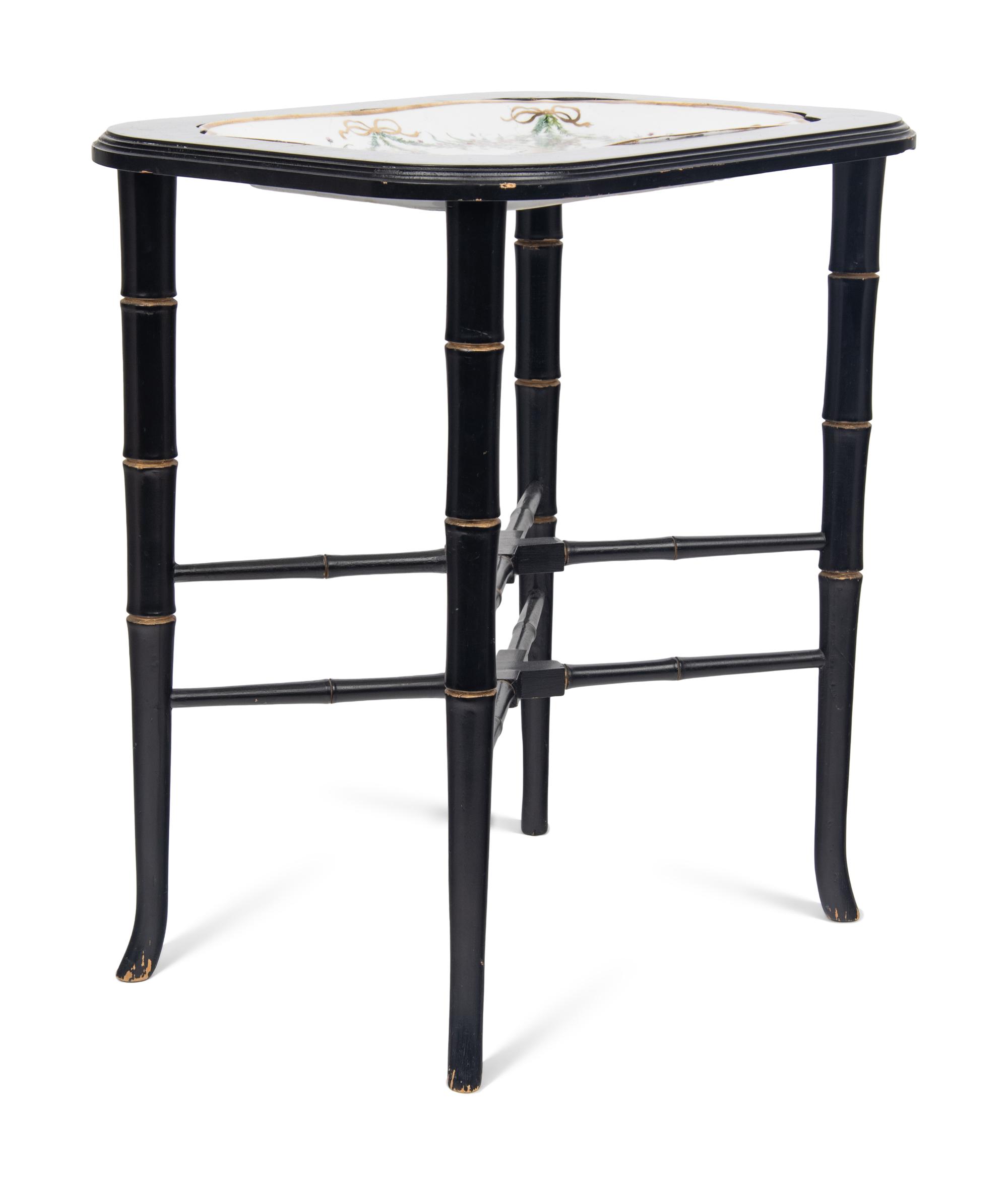A German Porcelain Tray Set in a Later Ebonized Side Table