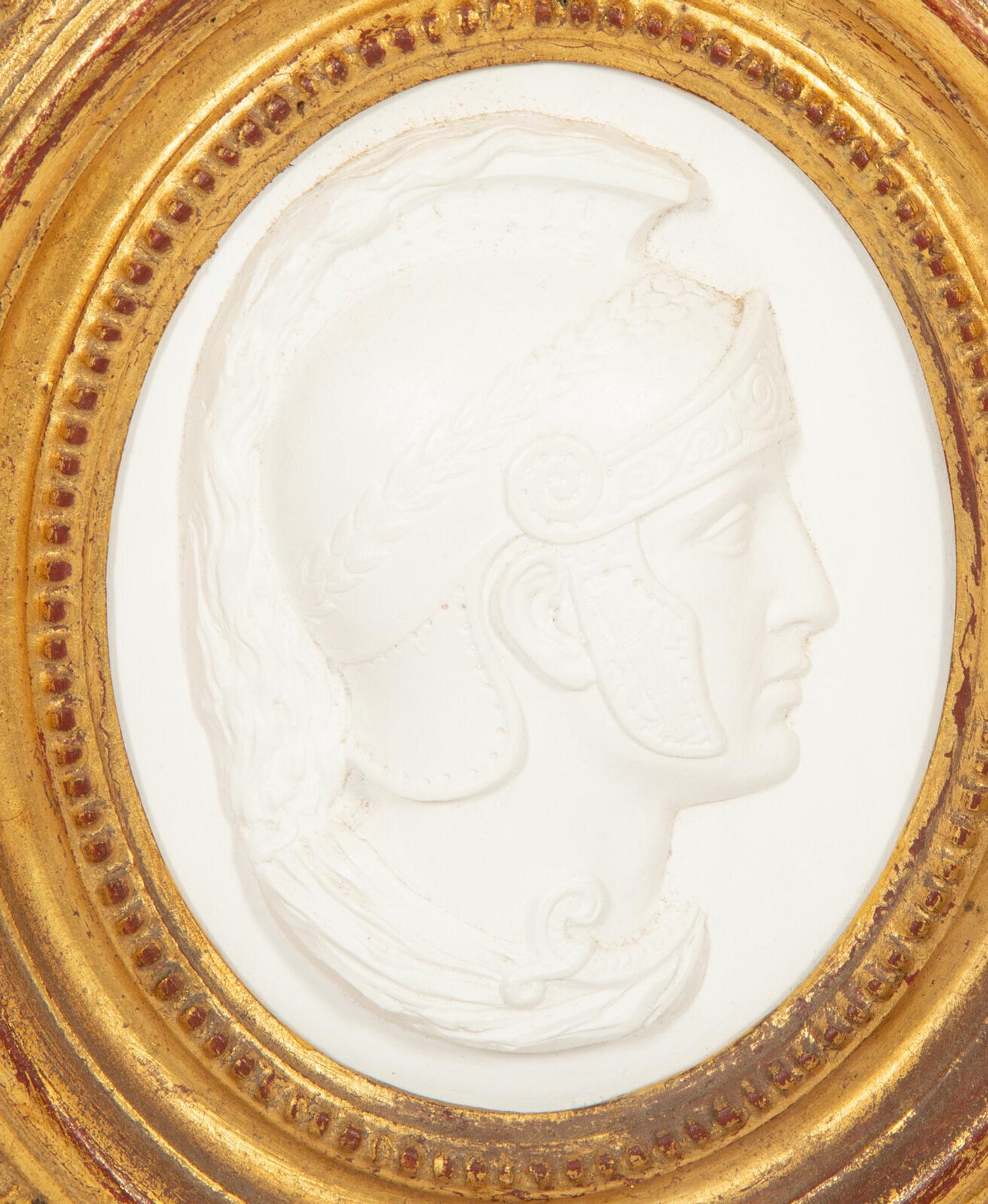 A Pair of Italian Bisque Portrait Medallions in Giltwood Frames