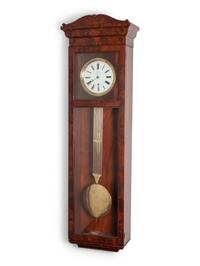 A Large Late Classical Figured Mahogany Wall Clock