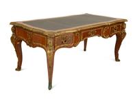 A Louis XV Style Kingwood Gilt Bronze Mounted Bureau Plat