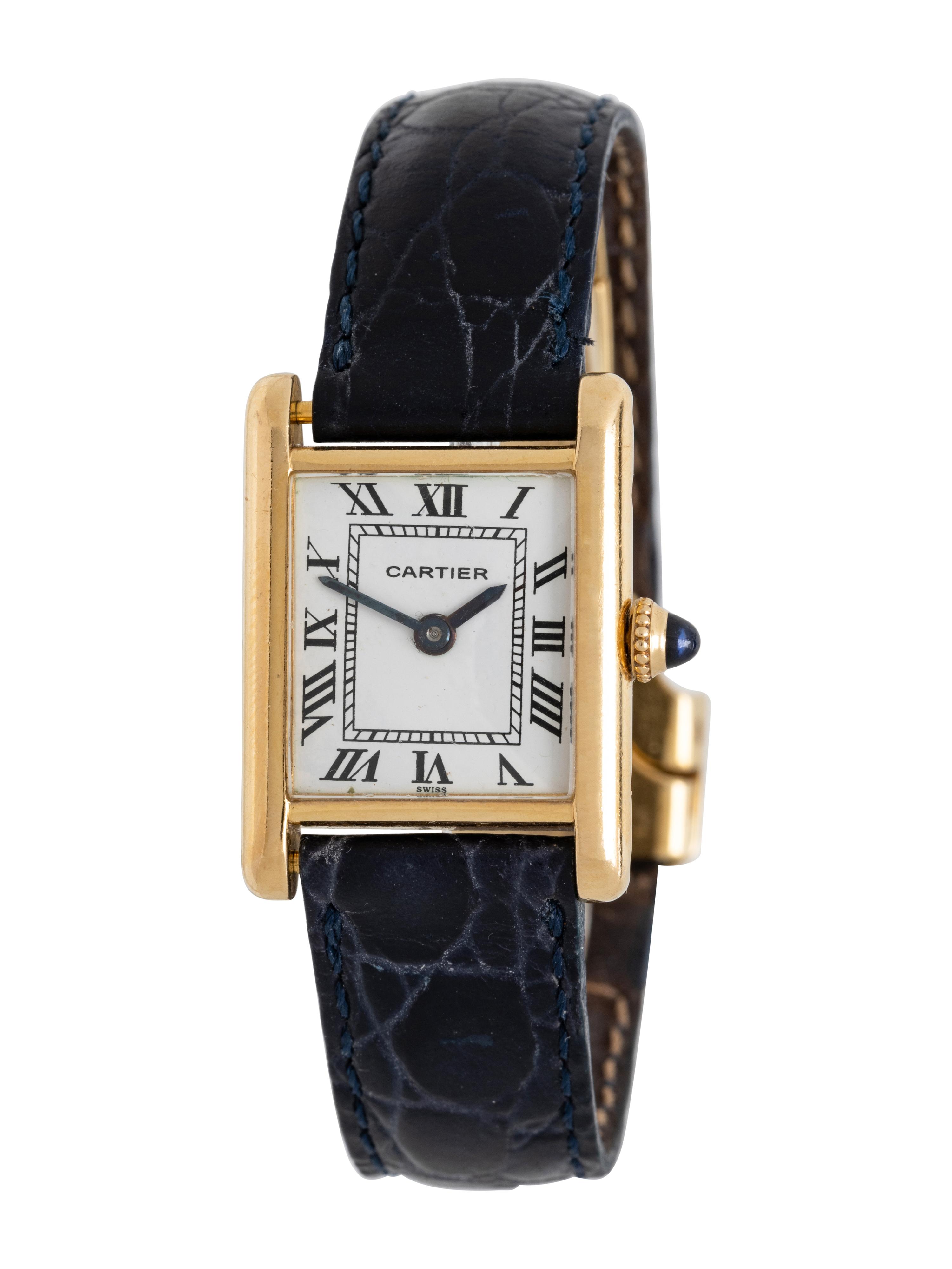 CARTIER NEW YORK, 18K YELLOW GOLD 'TANK' WATCH WITH AUDEMARS PIGUET MOVEMENT AND CARTIER DEPLOYANT BUCKLE
