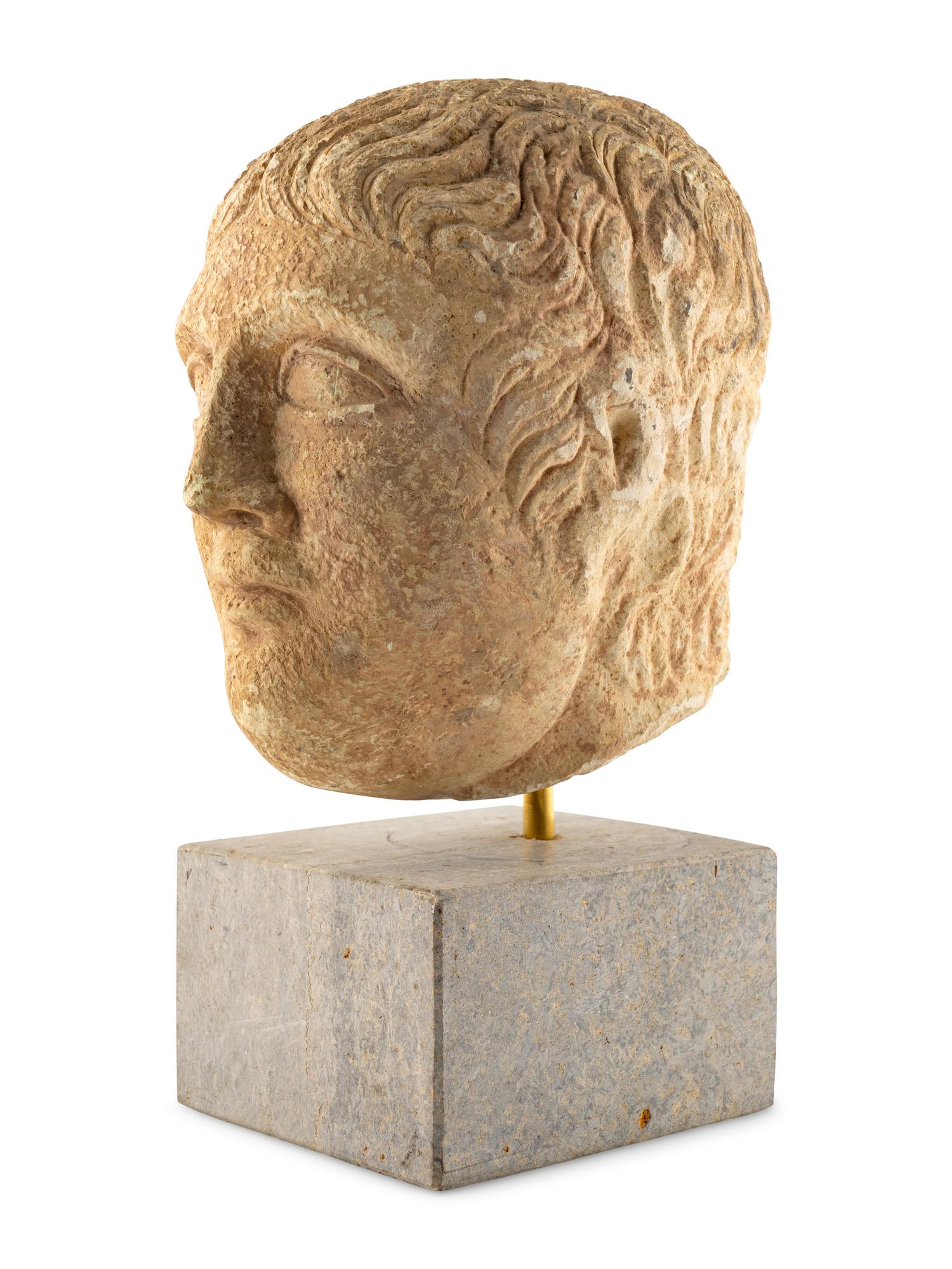 A Roman Stone Head of a Man