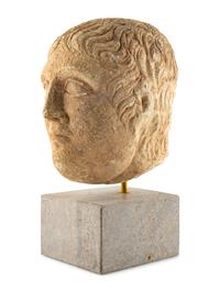 A Roman Stone Head of a Man