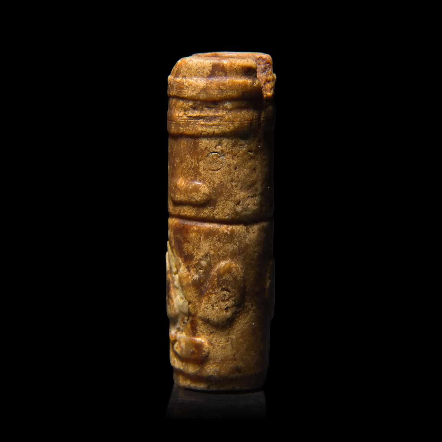 An Archaic Chinese Jade Pendant with Mask, Liangzhu Culture, and a Jade Jue, Western Zhou 良渚文化神人獸面紋玉勒及西周玉玨各一
