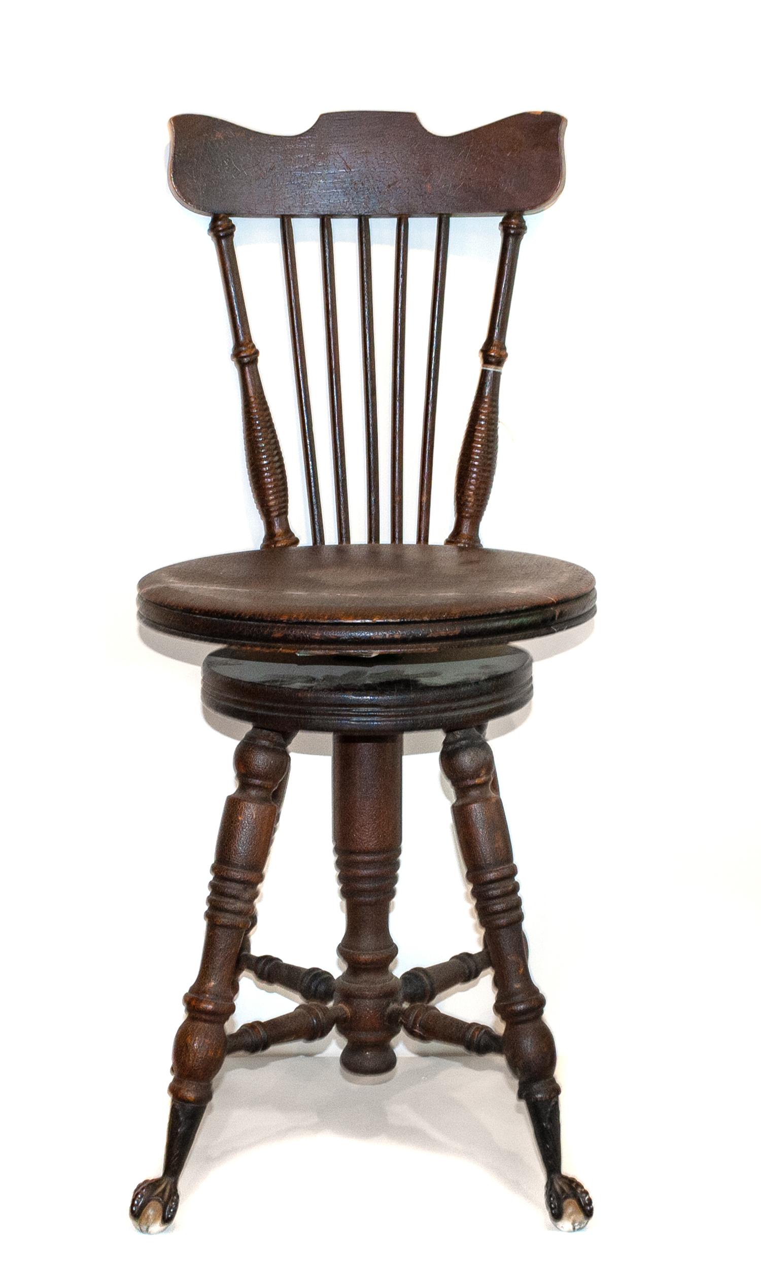 A Victorian Mahogany Piano Chair