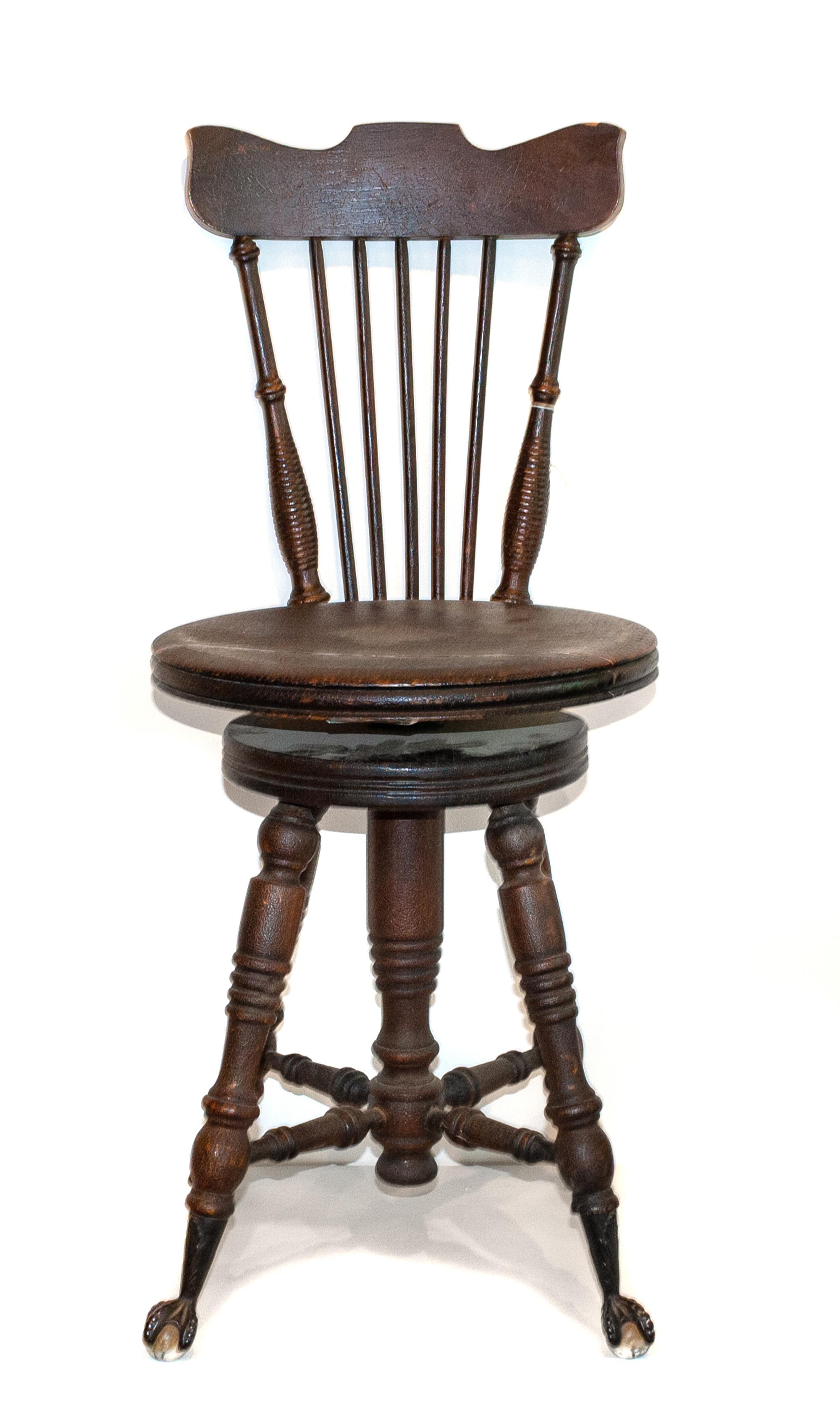A Victorian Mahogany Piano Chair
