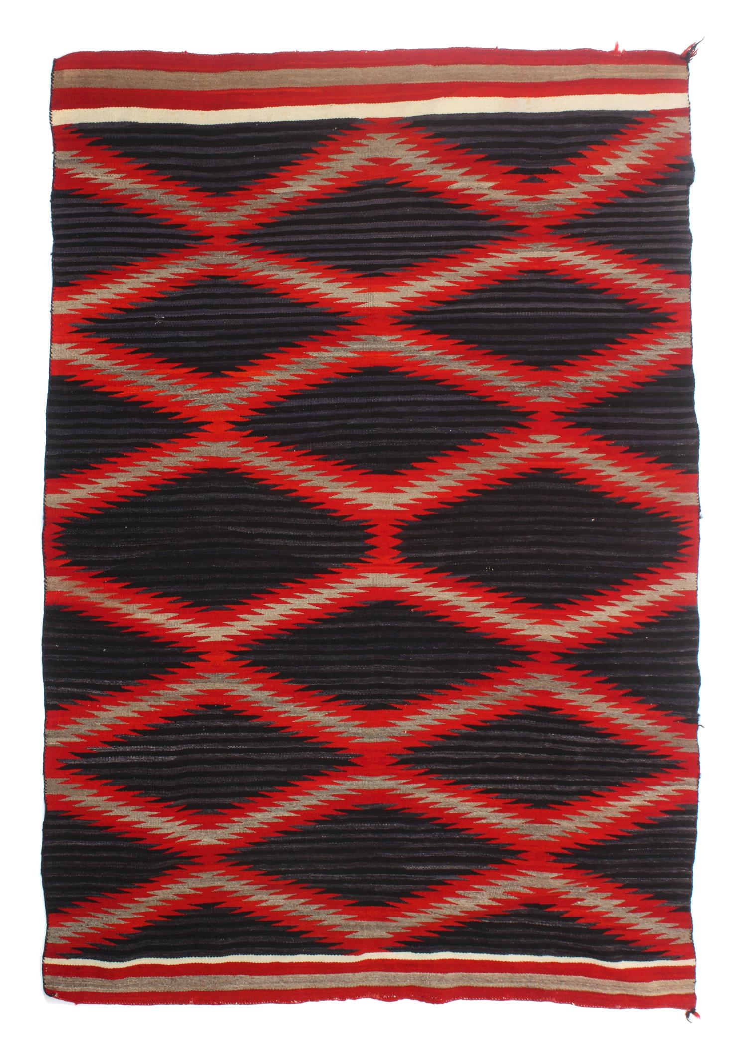 A Navajo Moki Design Transitional Rug 75 1/2 x 55 inches.