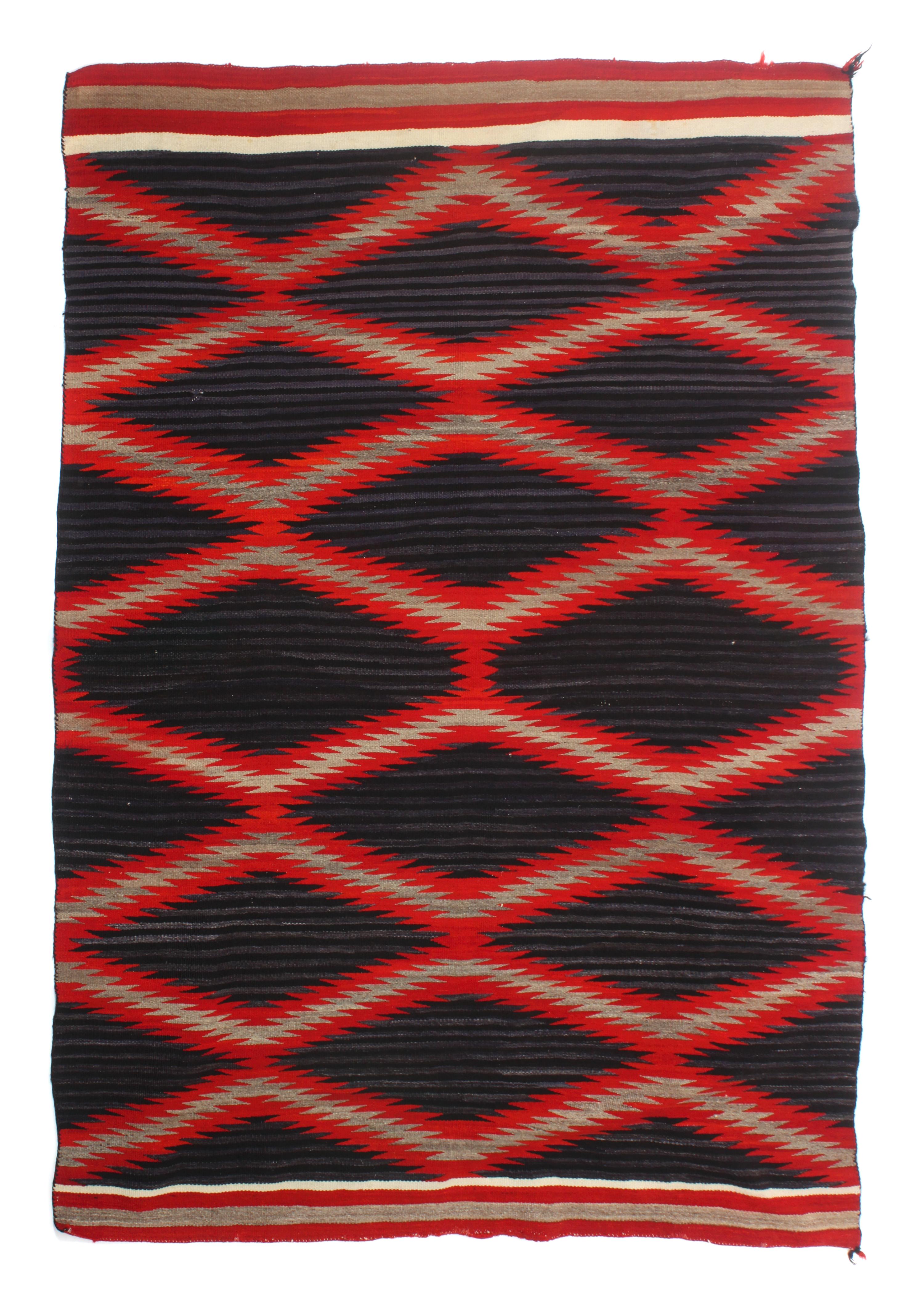 A Navajo Moki Design Transitional Rug 75 1/2 x 55 inches.