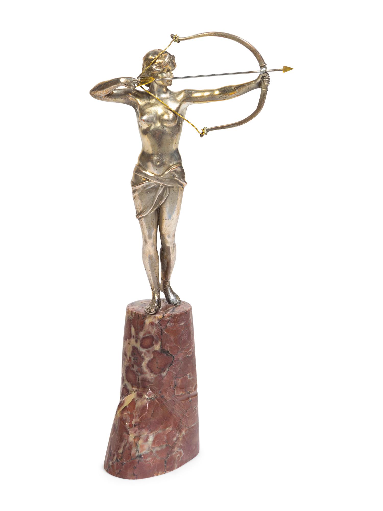 A Continental Silvered Metal Figure of a Huntress
