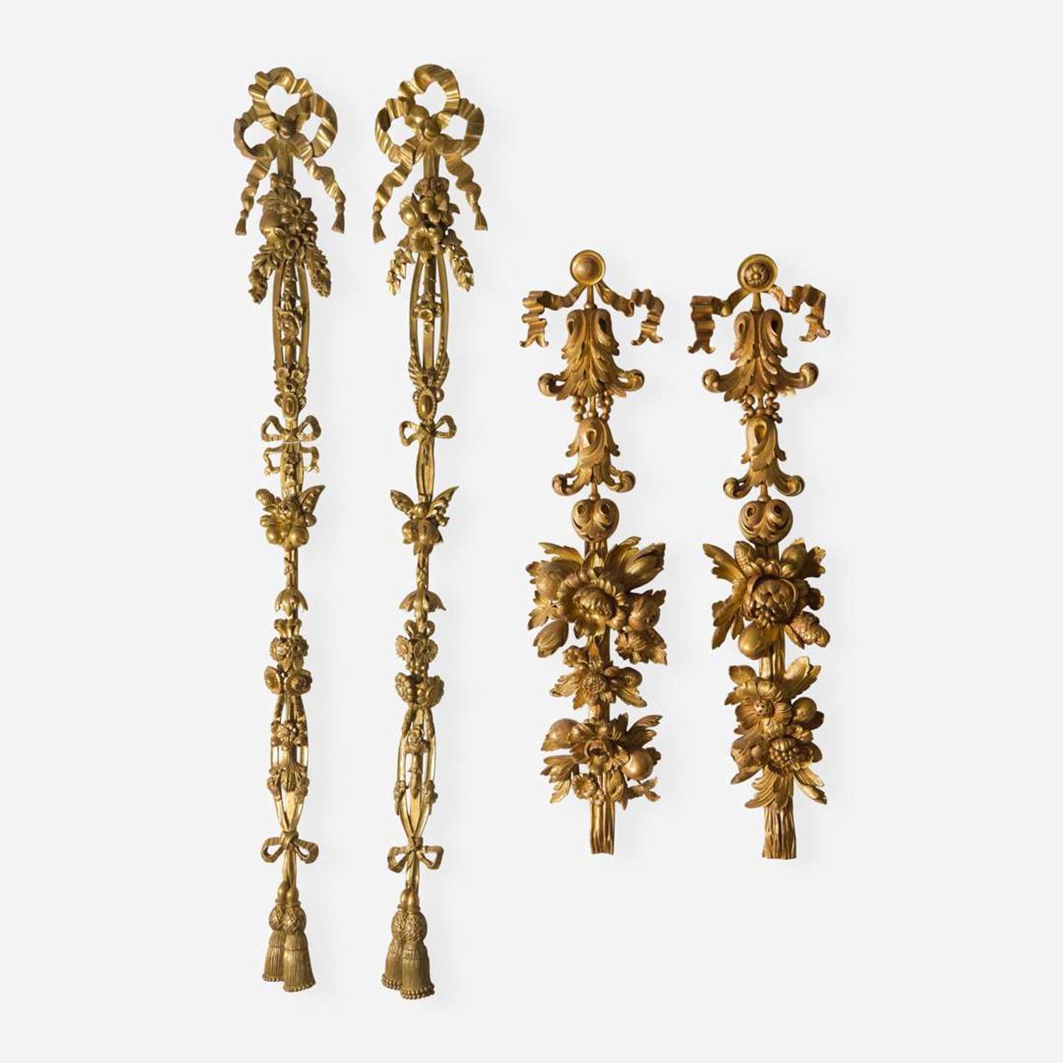 A group of four Georgian style giltwood ribbon, fruit, and floral swag wall appliques late 19th / 20th century