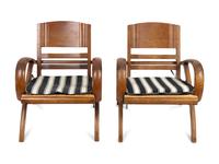 A Pair of British Colonial Teak Open Armchairs — FIRST QUARTER 20TH CENTURY