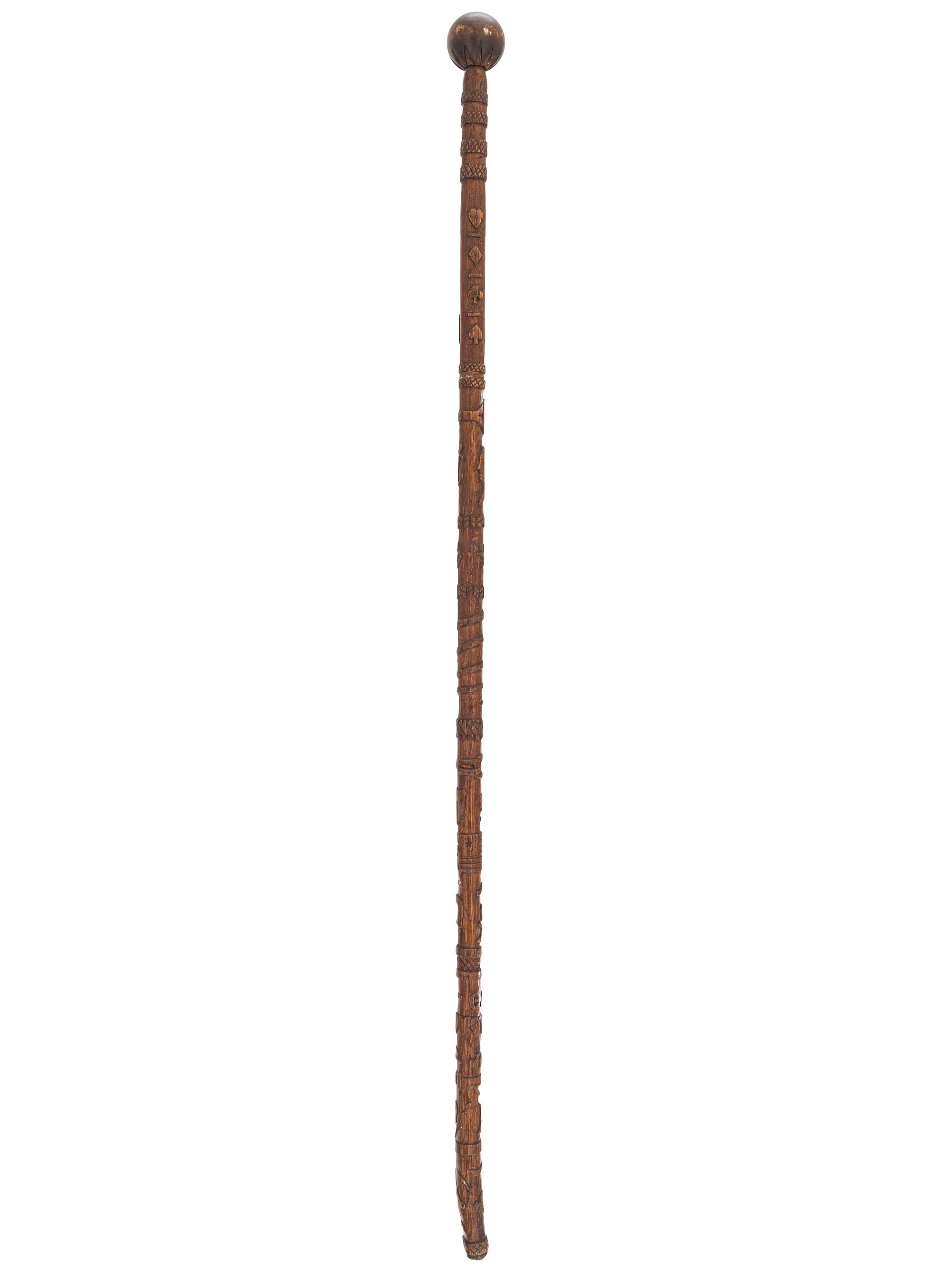 [CIVIL WAR]. GAR folk art carved cane featuring corps badges and patriotic motifs.