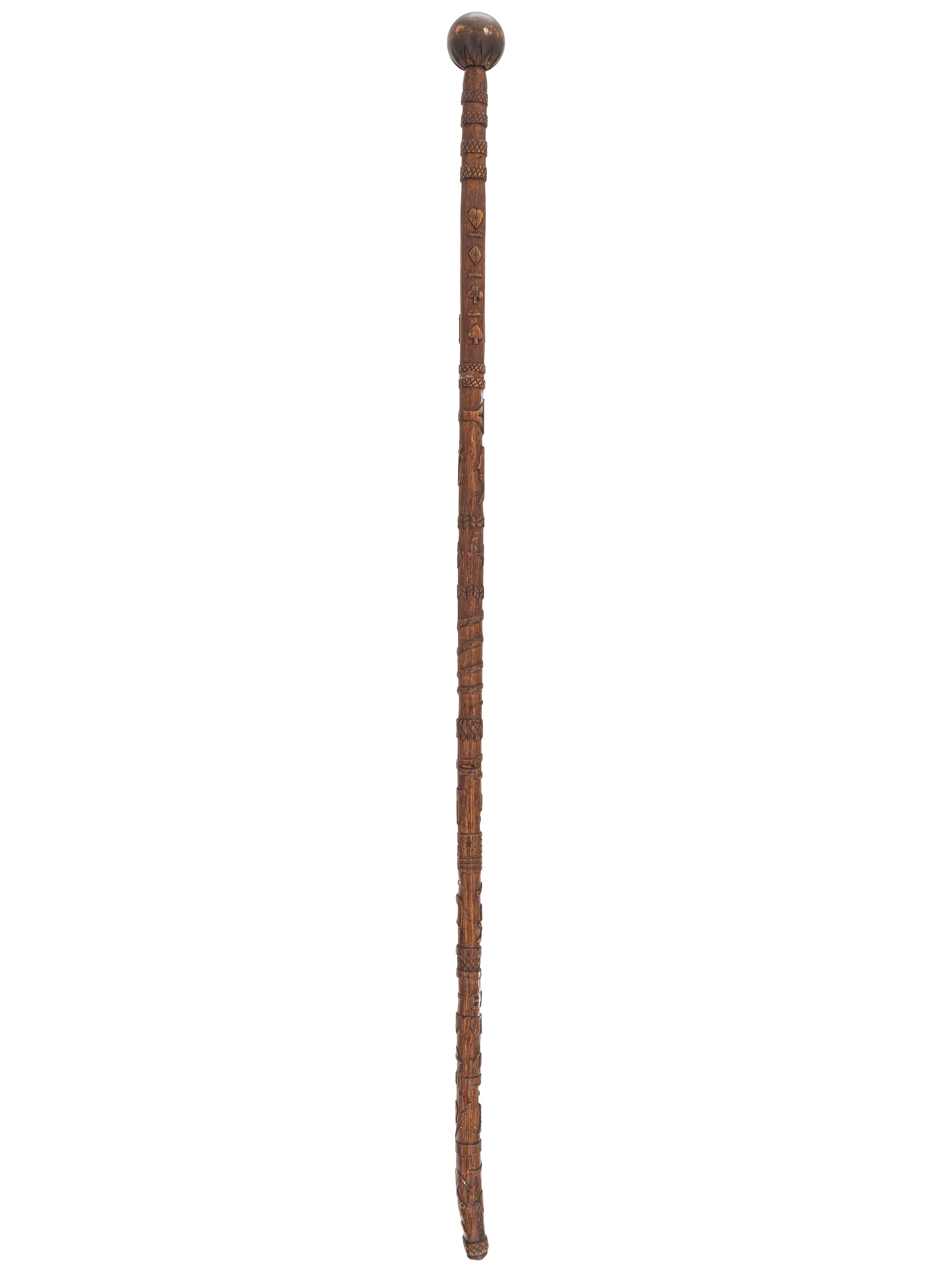[CIVIL WAR]. GAR folk art carved cane featuring corps badges and patriotic motifs.
