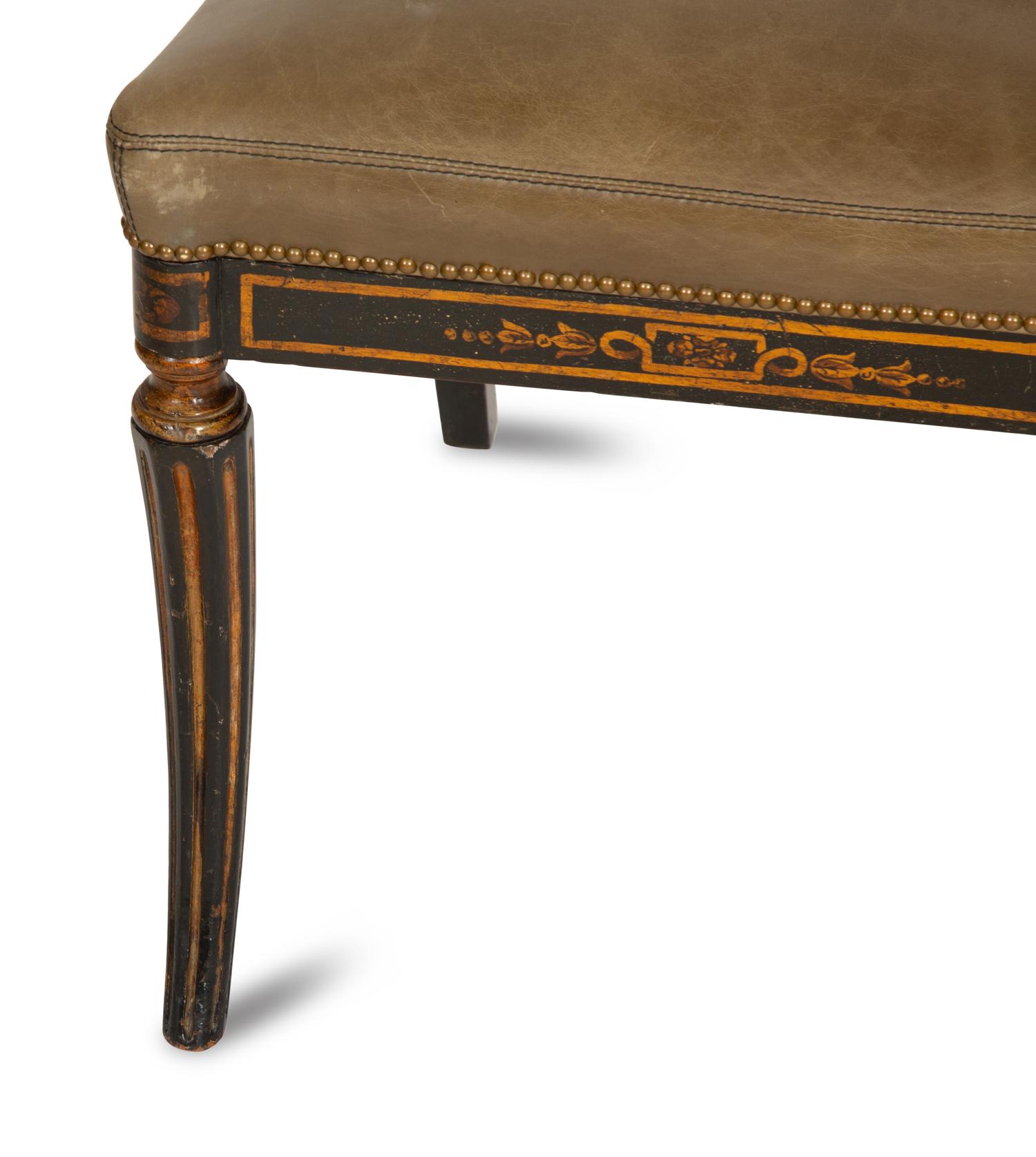 A Set of Four English Regency Style Ebonized and Parcel Gilt Mahogany Dining Chairs
