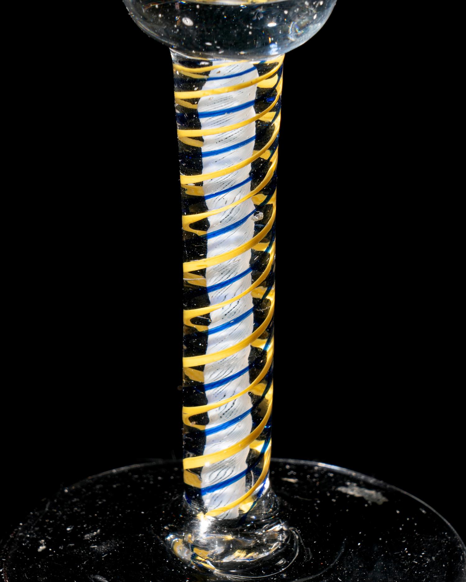 A Rare Canary-Yellow and Blue Color Twist Engraved Wine Glass
