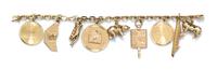 A 14 Karat Yellow Gold Charm Bracelet with Nine Attached Charms, 55.10 dwts.