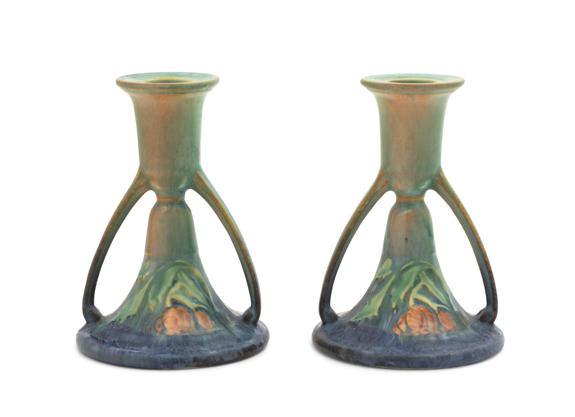 A Pair of Roseville Baneda Pottery Candlesticks Height 5 1/4 inches.