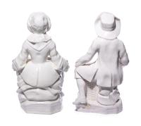 A Pair of French Soft-Paste Porcelain White Bouquetière Figures