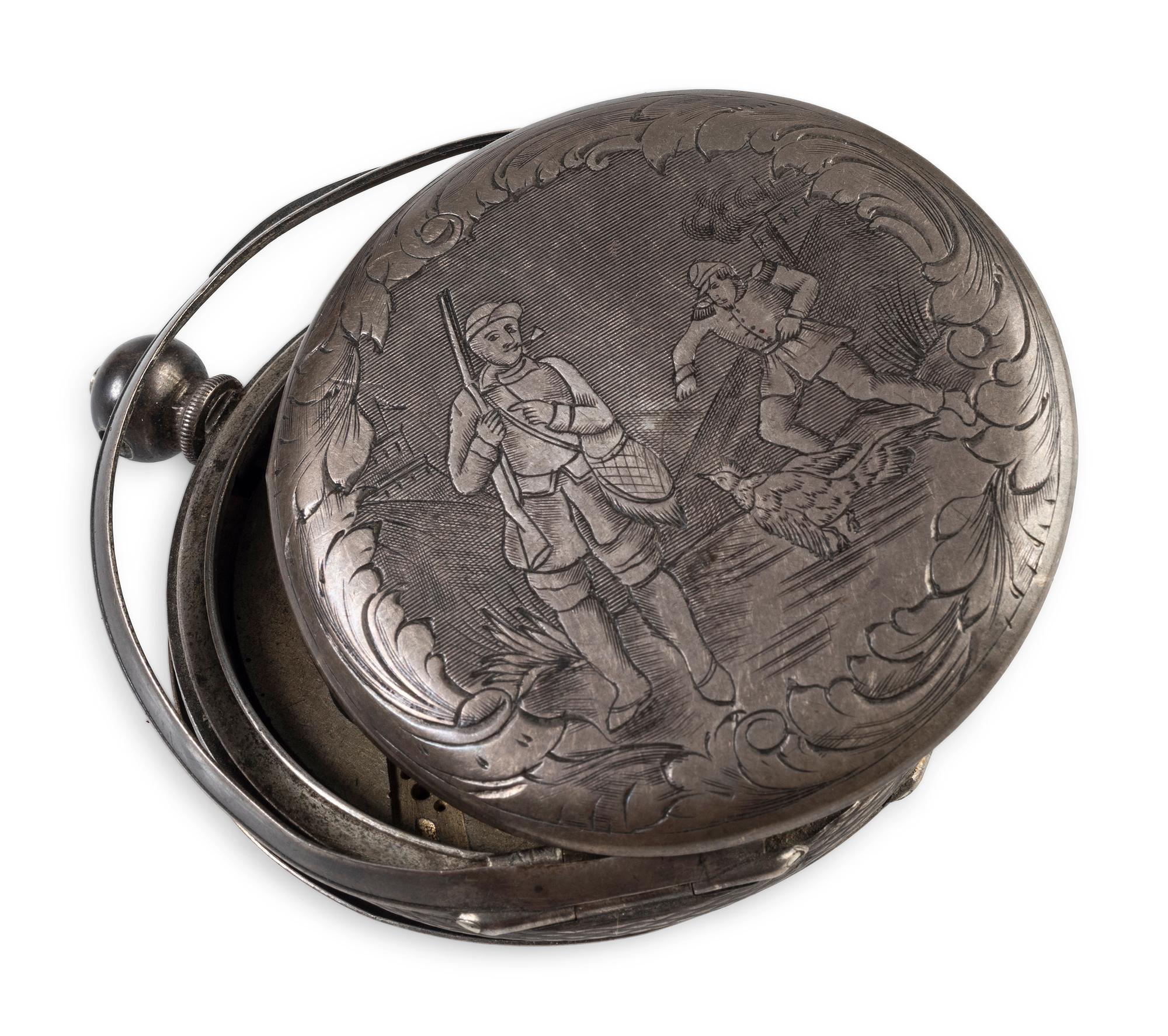 Corporal William L. Miller, Company G, 7th Indiana Volunteers. Bullet-struck pocket watch carried at the Battle of the Wilderness, which saved his life, with original bullet that almost ended it. May 1864.