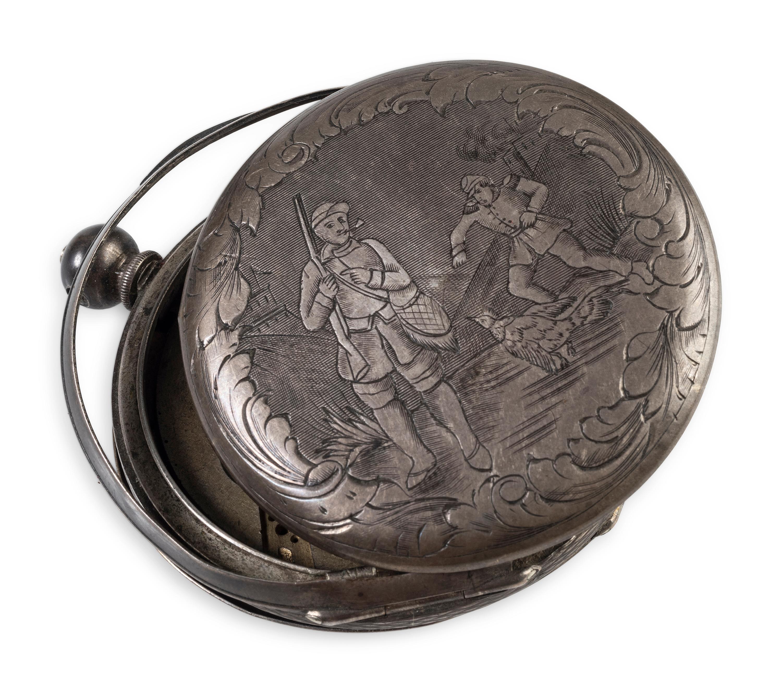 Corporal William L. Miller, Company G, 7th Indiana Volunteers. Bullet-struck pocket watch carried at the Battle of the Wilderness, which saved his life, with original bullet that almost ended it. May 1864.