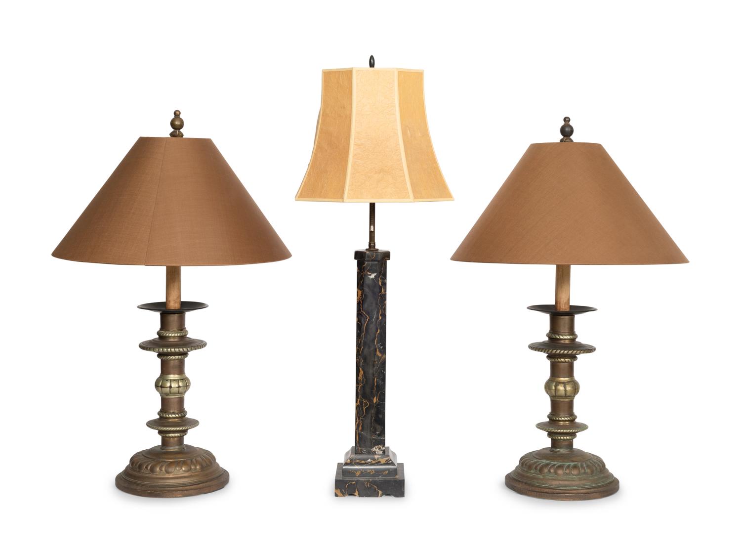 A Pair of Copper Prickets Mounted as Lamps and Associated Black Marble Lamp