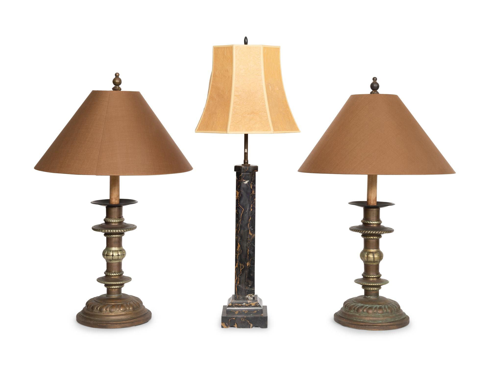 A Pair of Copper Prickets Mounted as Lamps and Associated Black Marble Lamp
