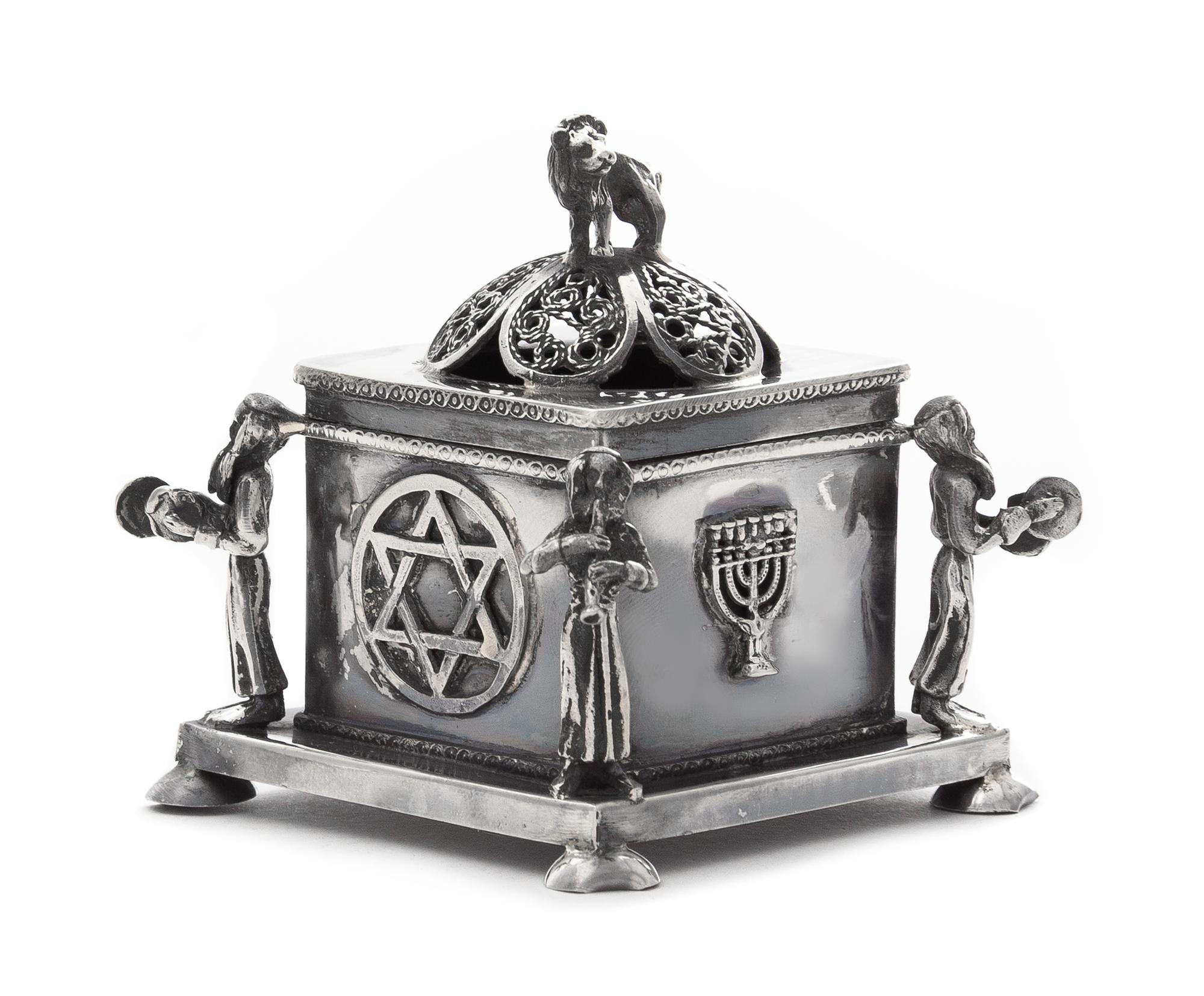 A Russian Silver Spice Box, Maker's Mark Obscured, Assay Mark O.C., Minsk, 1874, the lion form finial above the domed filigree decorate