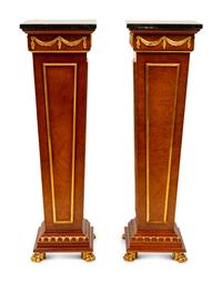 A Pair of Regency Style Parcel Gilt Pedestals