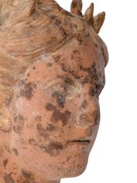 A Roman Style Terracotta Head of a Woman