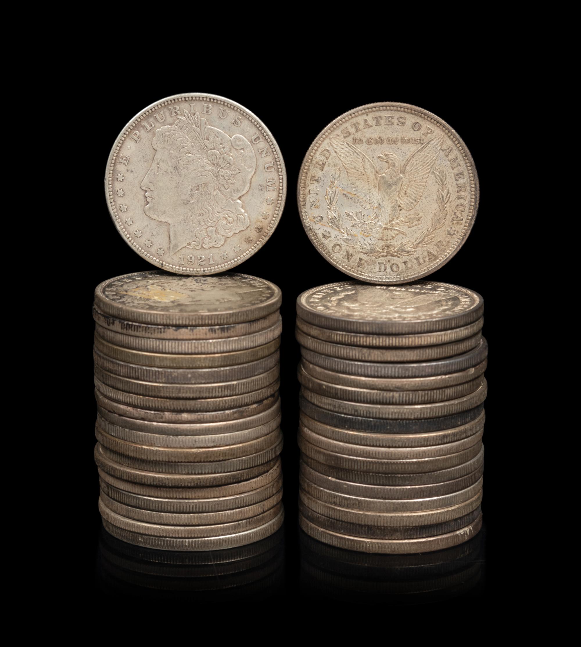 A Collection of Thirty-Seven Morgan $1 Coins