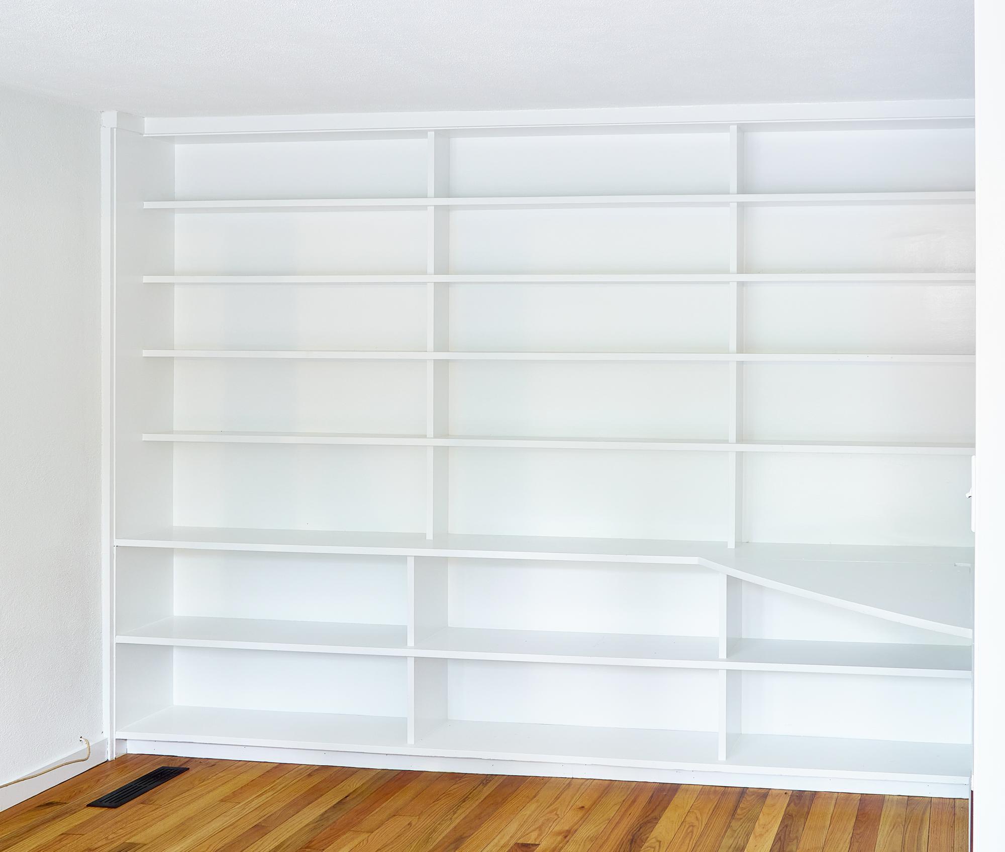 Built-in bookshelves and storage cabinet, 1954