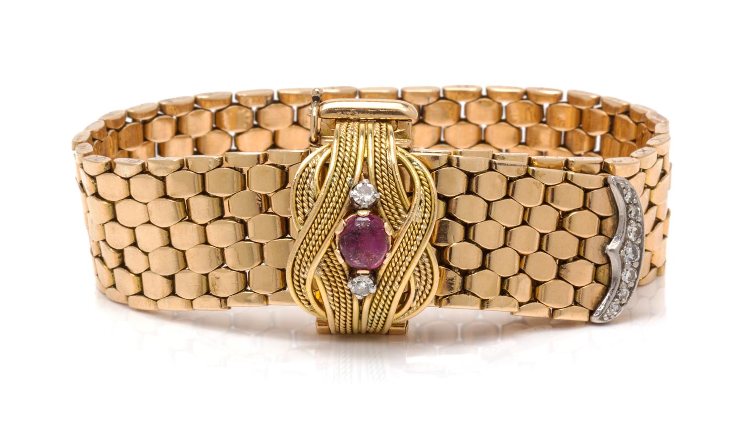 A Retro Platinum, Gold, Ruby and Diamond Belt Bracelet, 38.60 dwts.