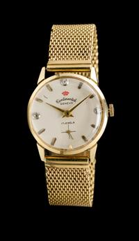 A 14 Karat Yellow Gold Wristwatch, Continental Geneva,