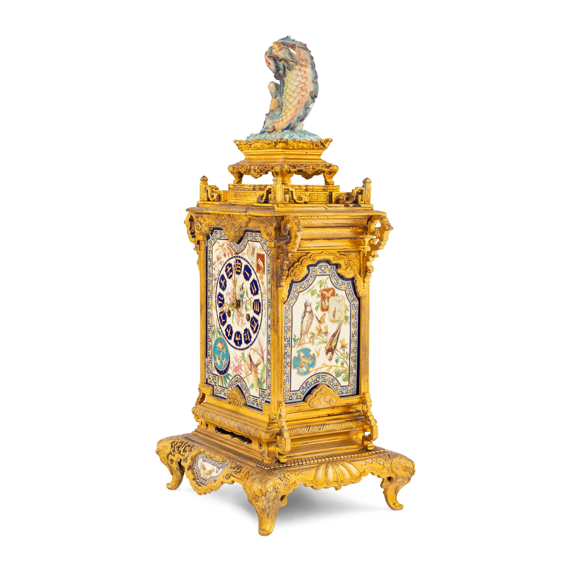 A French "Japonisme" Gilt Bronze and Porcelain Mounted Clock